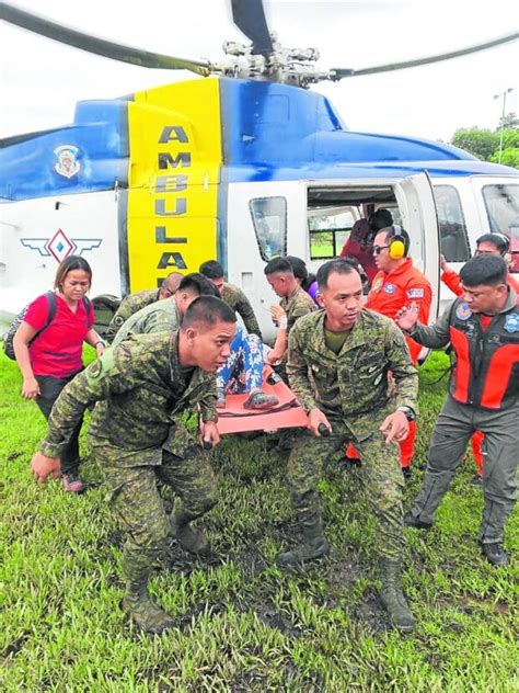 Mining village landslide kills 7; over 40 missing .